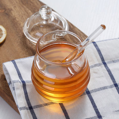 Tarro de la miel del vidrio de Borosilicate con el goteador Eco a prueba de calor amistoso proveedor