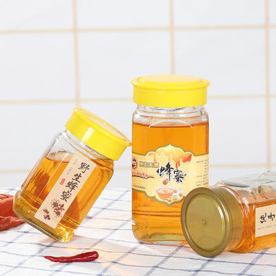 Tarro de cristal cuadrado claro vacío de la miel con diseño clásico de la tapa plástica del tornillo proveedor