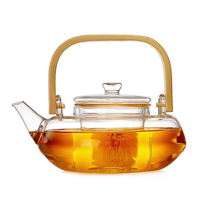Pote floreciente transparente del té con el filtro, taza de té soplada mano fijada con la caldera proveedor