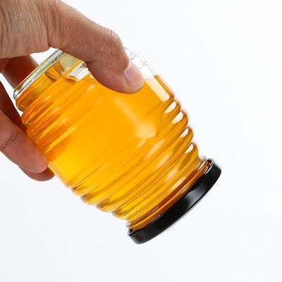 La forma de la abeja pocos tarros del vidrio, desea roscado alrededor del tarro de cristal con la tapa proveedor