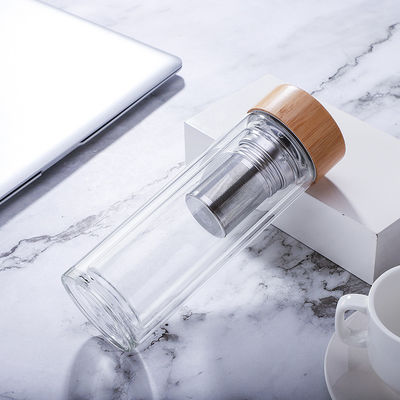 Botella de cristal modificada para requisitos particulares de Borosilicate, botella de consumición de cristal clara con la tapa de bambú proveedor