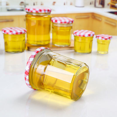 Vacío de cristal del tarro del atasco del diseño del cliente para redondo de la tapa del tornillo de la miel formado proveedor