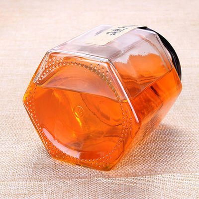 Forma hexagonal del tarro de cristal apilable hecho a mano del atasco pequeña para el almacenamiento de la comida proveedor