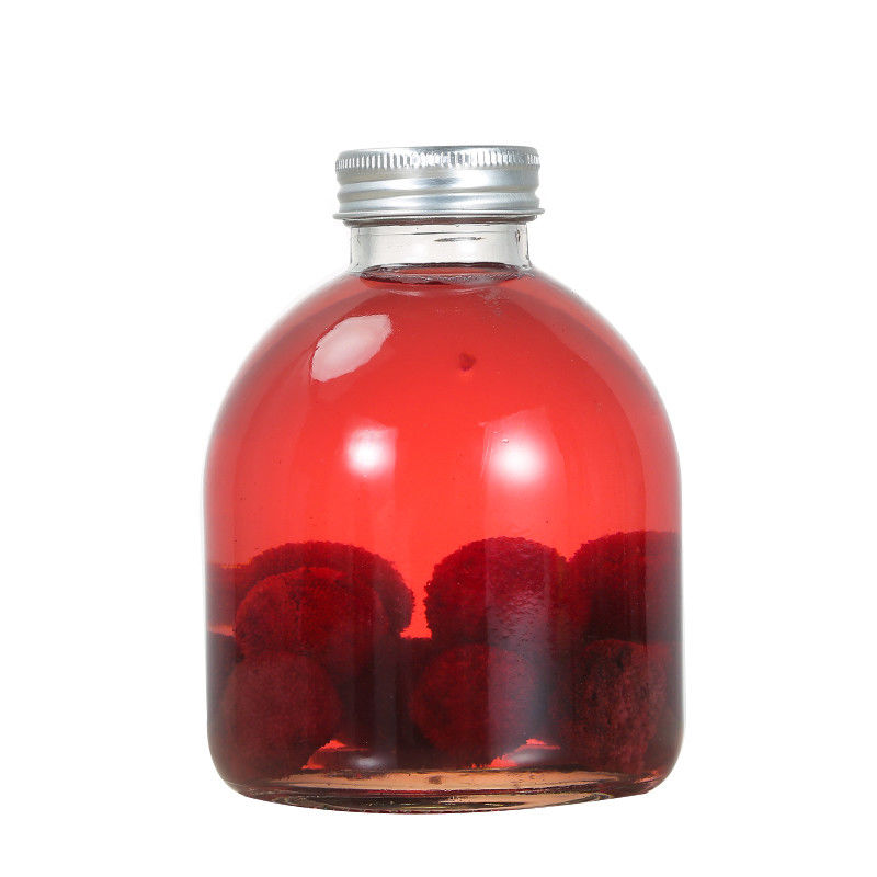 Botella fría al aire libre de la bebida 500ml, botella de cristal formada redonda especial del alcohol proveedor