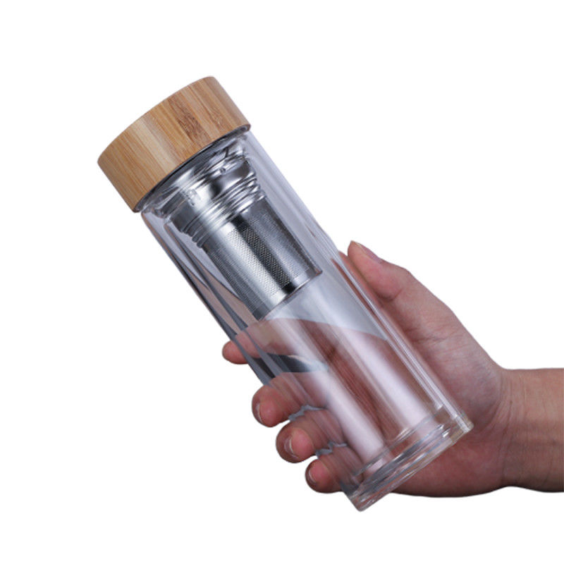 Botella de cristal modificada para requisitos particulares de Borosilicate, botella de consumición de cristal clara con la tapa de bambú proveedor