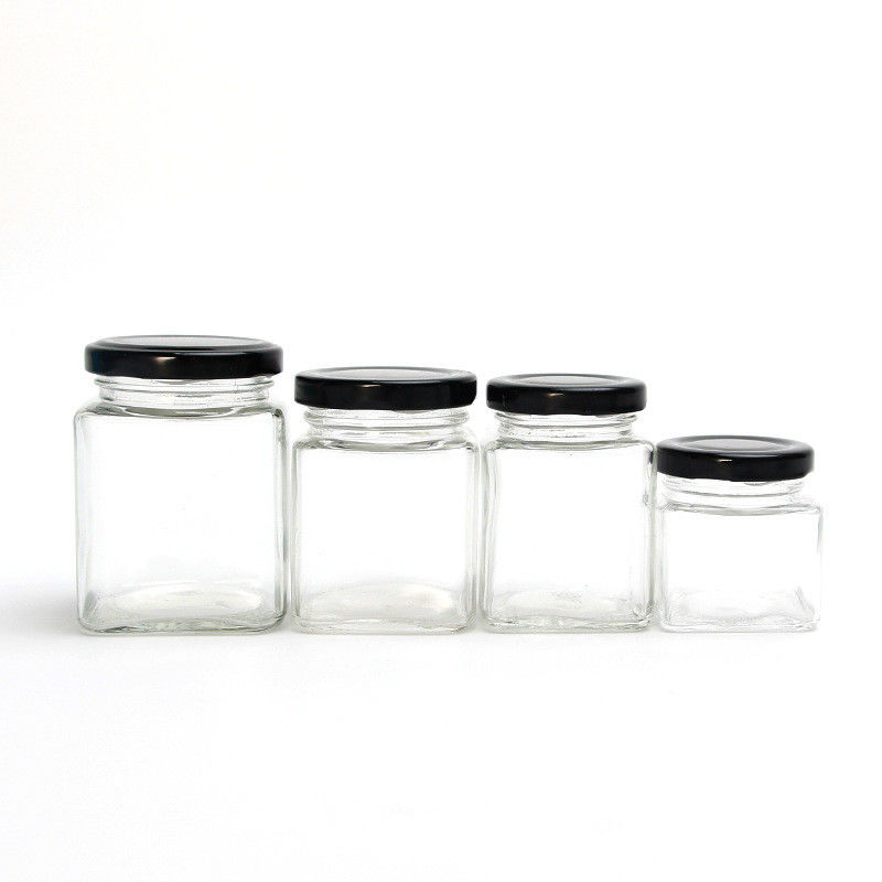 Tarros de cristal del caramelo de la miel cuadrada de la abeja, envase de comida de cristal durable fácil de utilizar proveedor